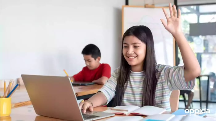 1 Student in class with laptop
