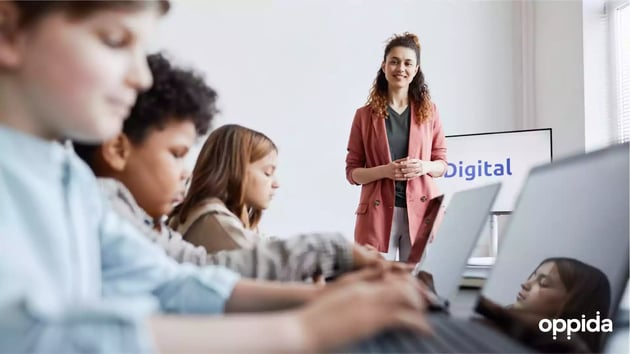 4 K12 students on laptops